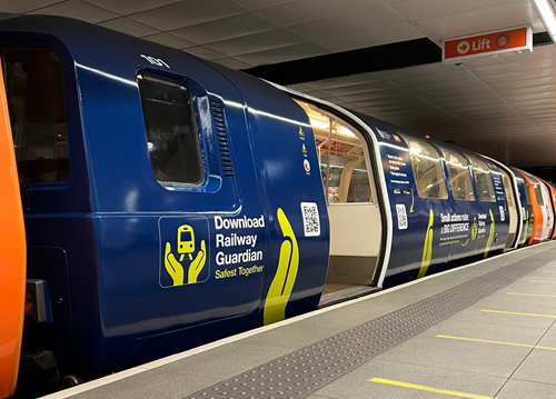 Picture shows Subway carriage with BTP branding and messaging.